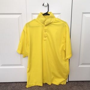 Large yellow Nike golf polo